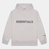Handla Fear of God Essentials "Heather Oatmeal" Applique hoodie (FW20) online | Smidigt och enkelt på nätet - Merchsweden |