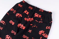 graphic-print "Black" Track Pants